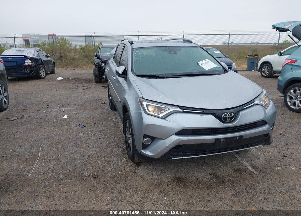 2018 TOYOTA RAV4 ADVENTURE/XLE VIN: 2T3RFREV7JW731178