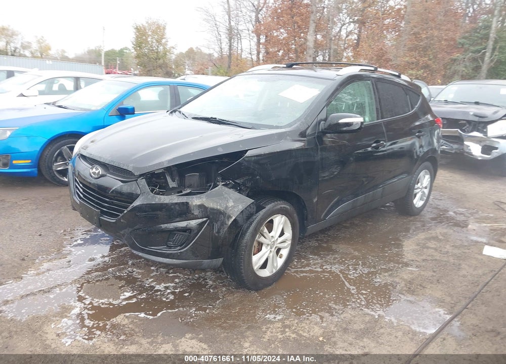 2012 HYUNDAI TUCSON GLS VIN: KM8JUCAC0CU397060