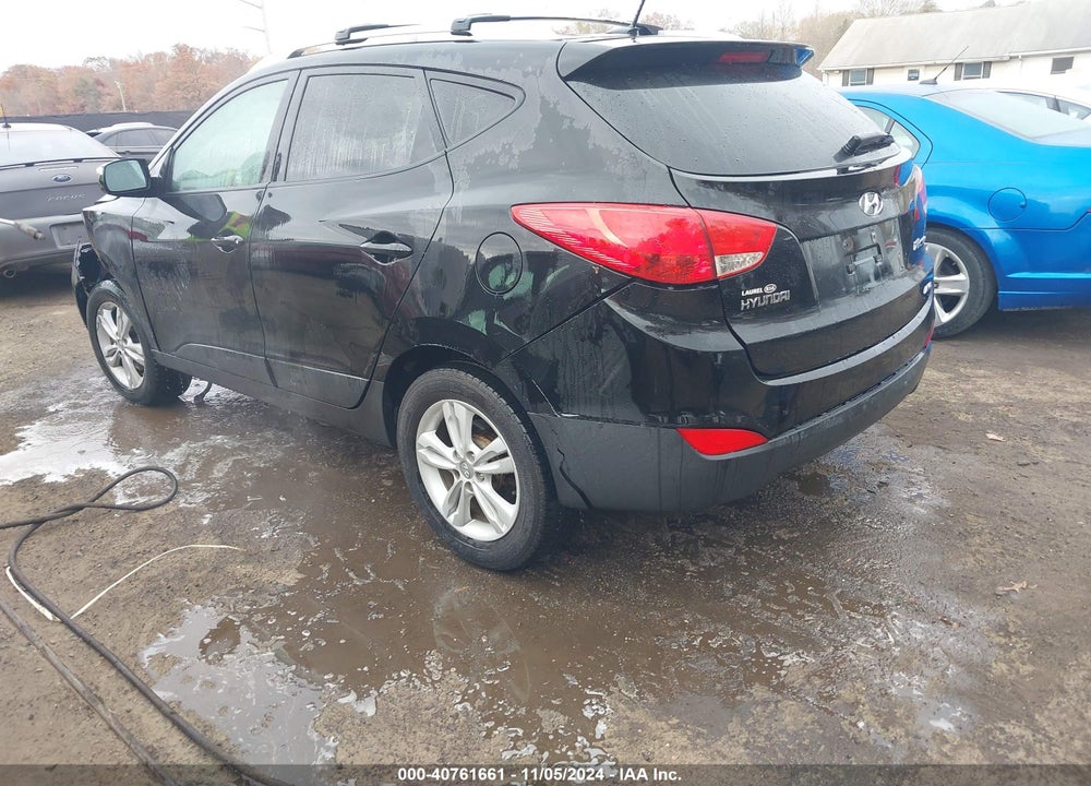 2012 HYUNDAI TUCSON GLS VIN: KM8JUCAC0CU397060