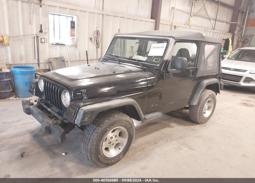 2002 JEEP WRANGLER X VIN: 1J4FA39S42P717339
