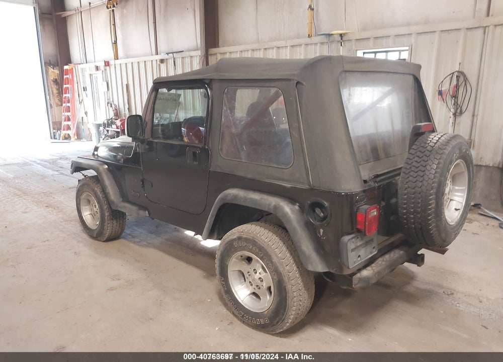 2002 JEEP WRANGLER X VIN: 1J4FA39S42P717339
