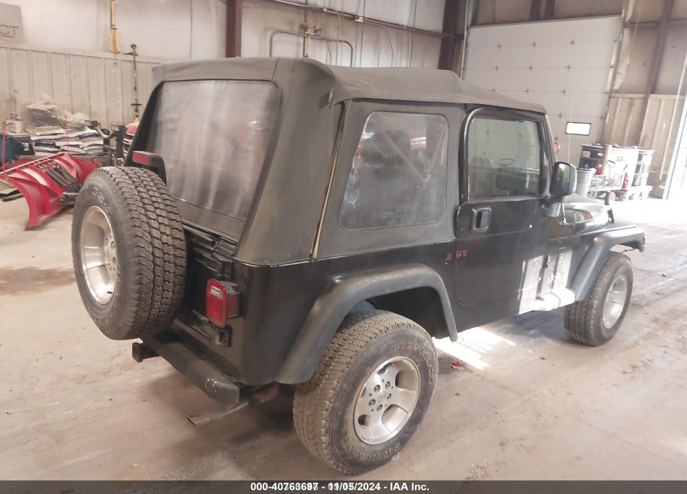 2002 JEEP WRANGLER X VIN: 1J4FA39S42P717339