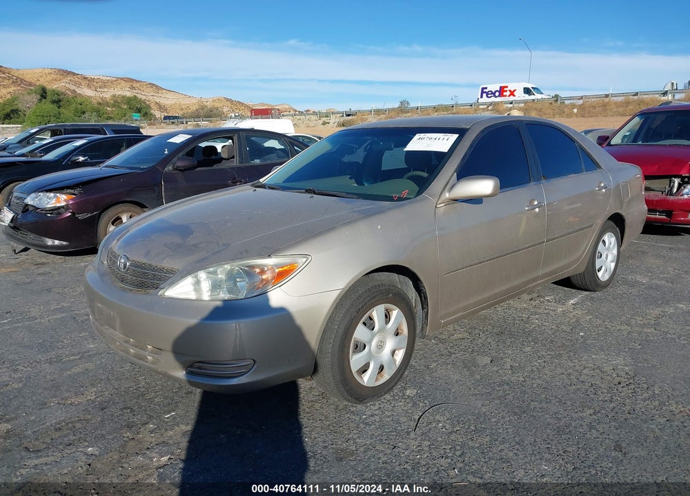 2004 TOYOTA CAMRY LE VIN: JTDBE32K940247419