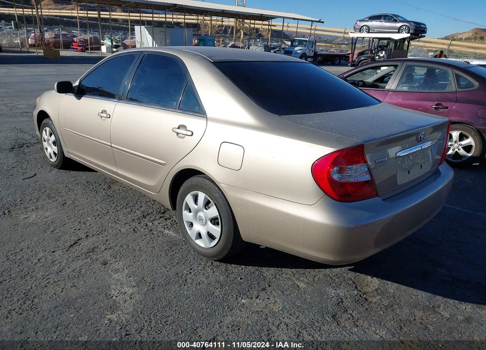 2004 TOYOTA CAMRY LE VIN: JTDBE32K940247419