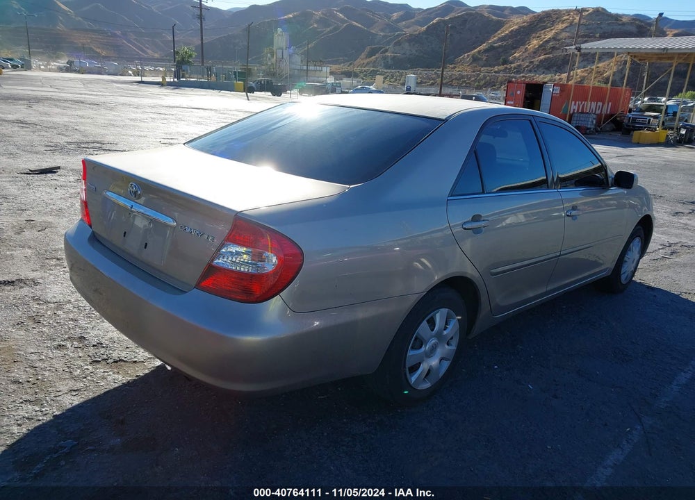 2004 TOYOTA CAMRY LE VIN: JTDBE32K940247419