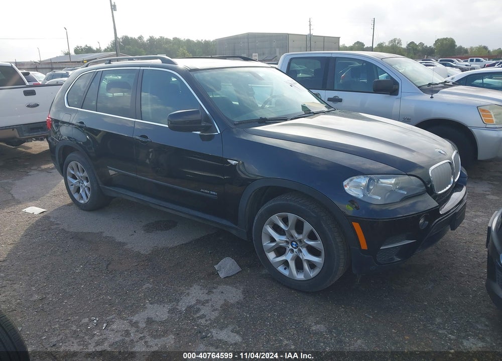2013 BMW X5 XDRIVE35I/XDRIVE35I PREMIUM/XDRIVE35I SPORT ACTIVITY VIN: 5UXZV4C56D0E02877