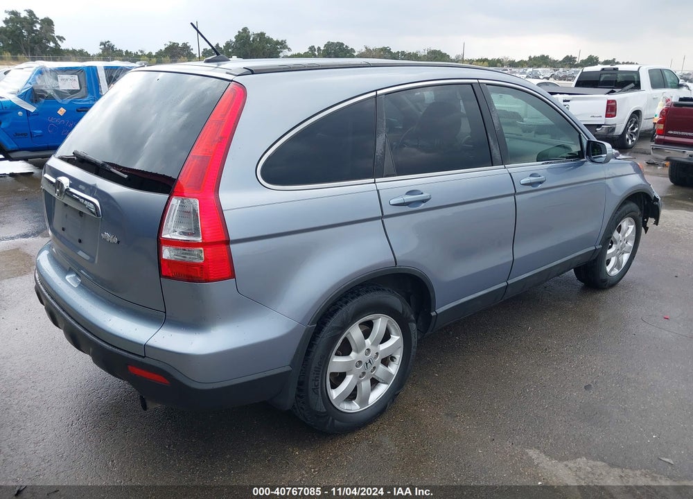 2007 HONDA CR-V EX-L VIN: JHLRE38757C047404