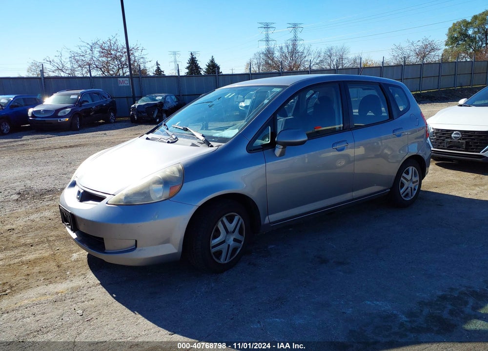2007 HONDA FIT VIN: JHMGD38497S066779