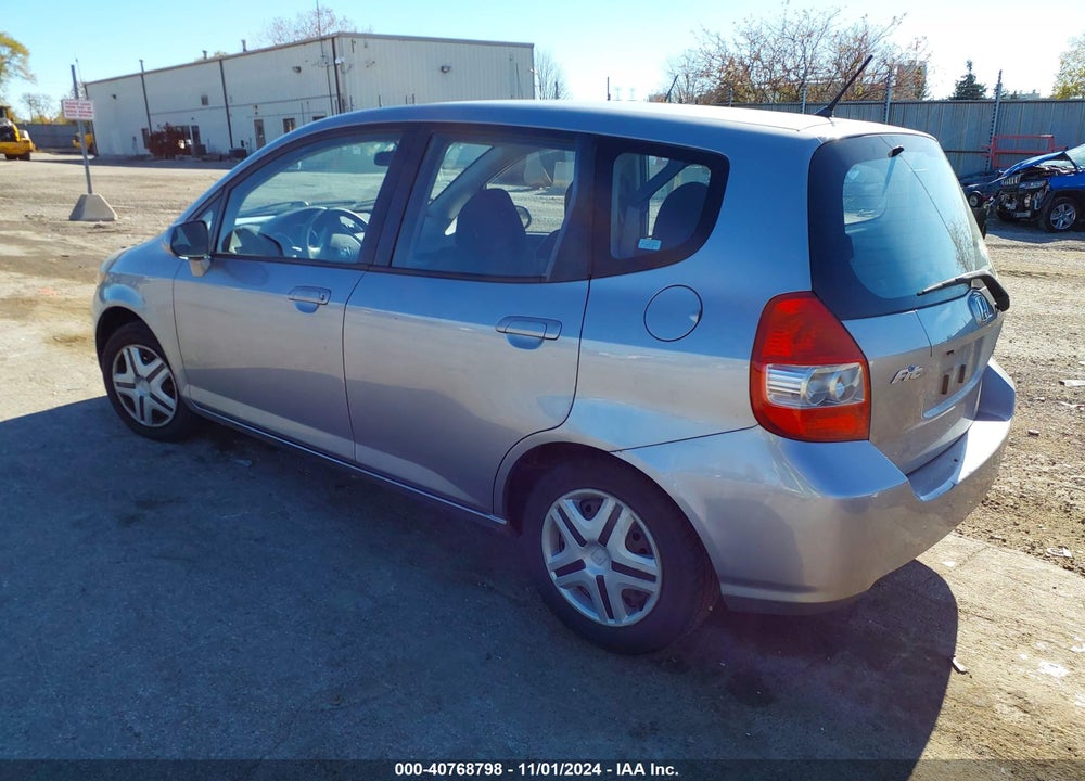 2007 HONDA FIT VIN: JHMGD38497S066779