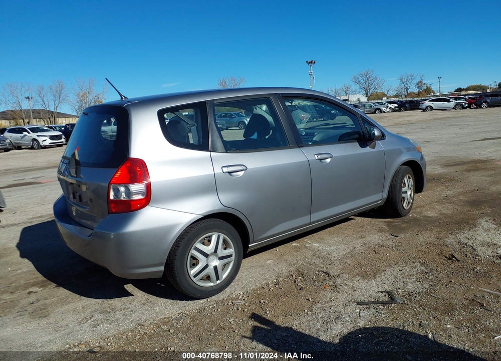 2007 HONDA FIT VIN: JHMGD38497S066779