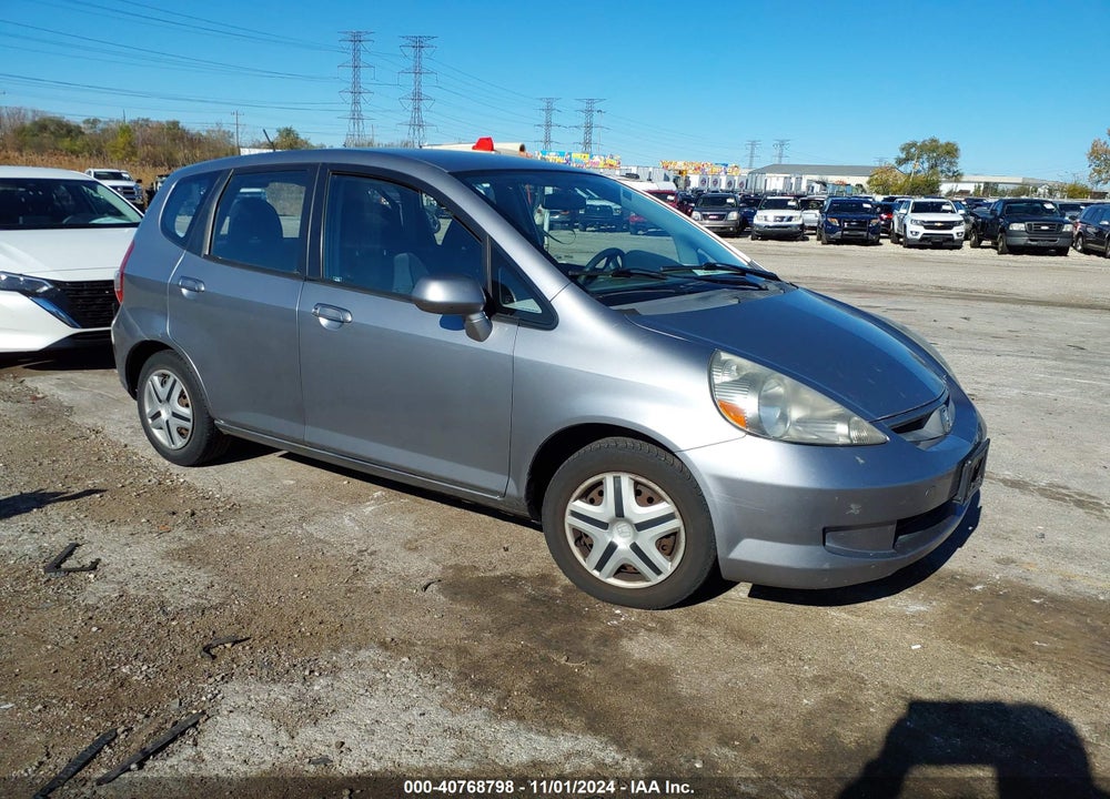 2007 HONDA FIT VIN: JHMGD38497S066779