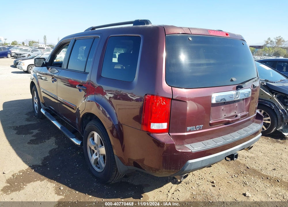 2011 HONDA PILOT EX-L VIN: 5FNYF3H55BB047631