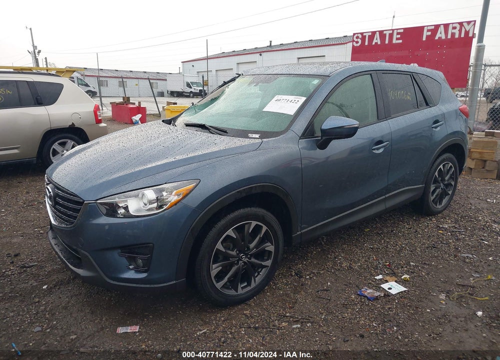 2016 MAZDA CX-5 GRAND TOURING VIN: JM3KE2DY9G0737348