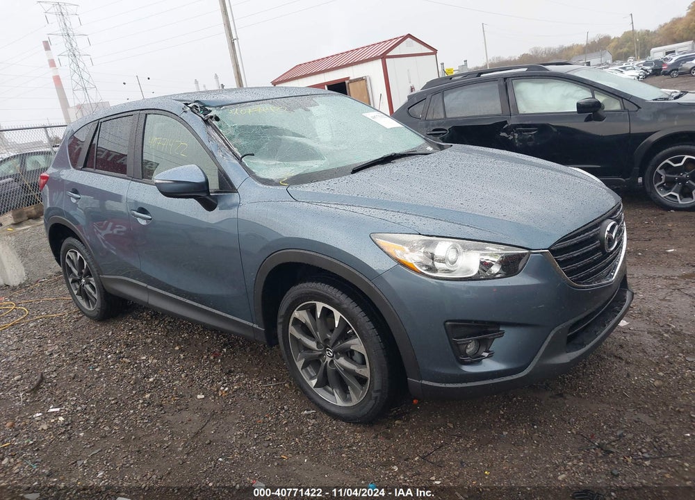 2016 MAZDA CX-5 GRAND TOURING VIN: JM3KE2DY9G0737348