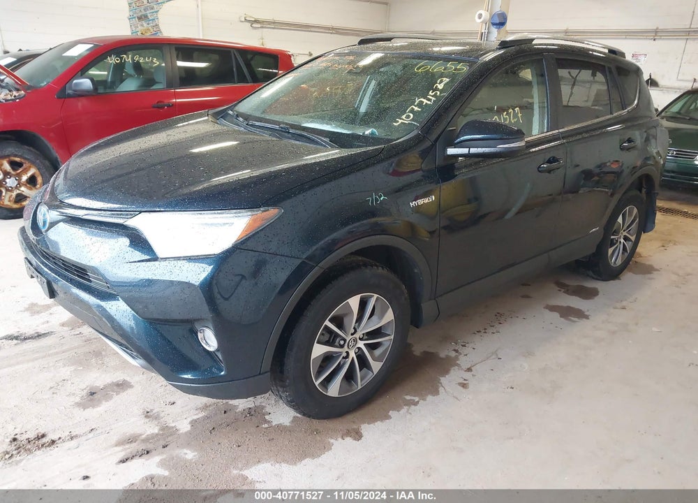 2018 TOYOTA RAV4 HYBRID XLE VIN: JTMRJREV6JD236496