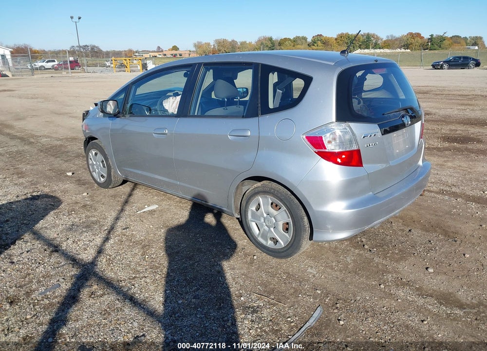 2012 HONDA FIT VIN: JHMGE8H38CS008979