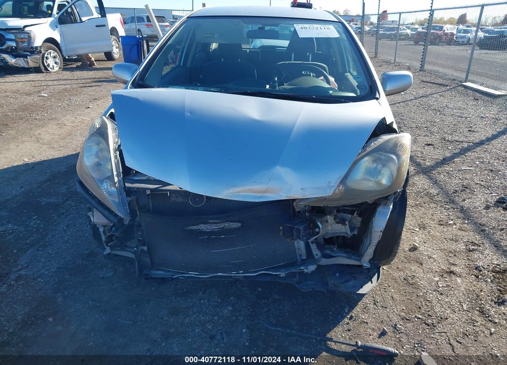 2012 HONDA FIT VIN: JHMGE8H38CS008979