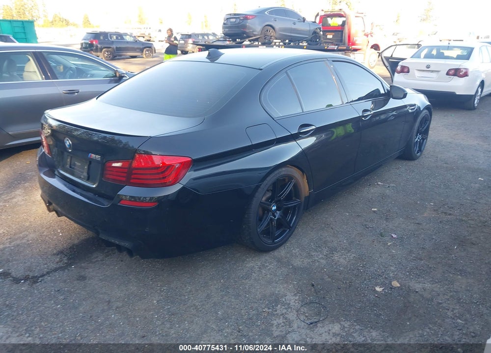 2014 BMW M5 VIN: WBSFV9C59ED594023