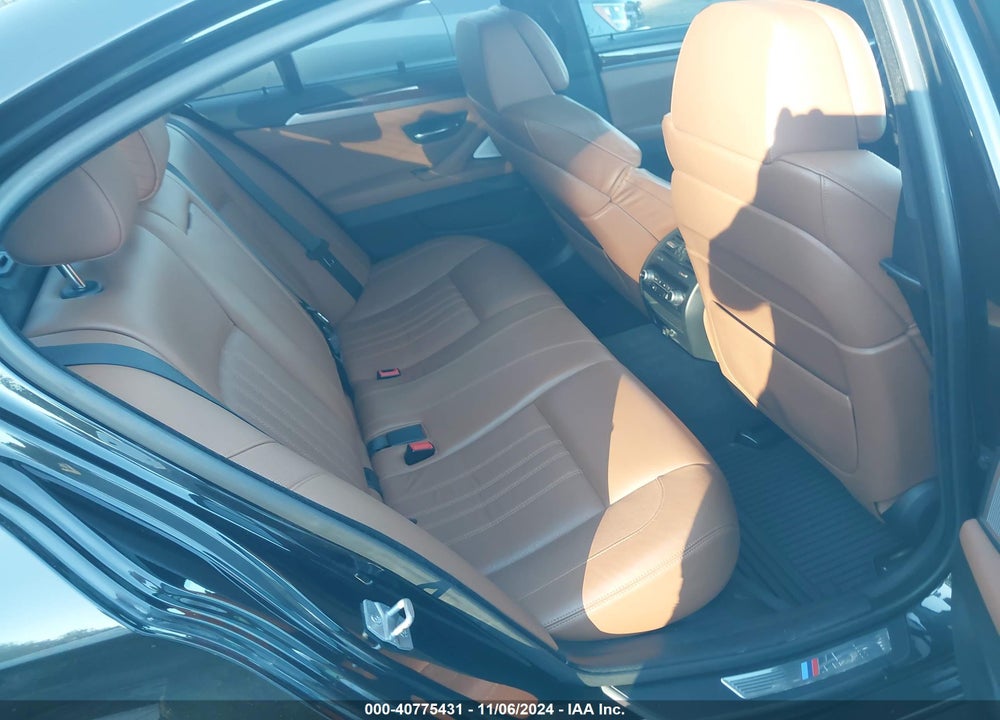2014 BMW M5 VIN: WBSFV9C59ED594023