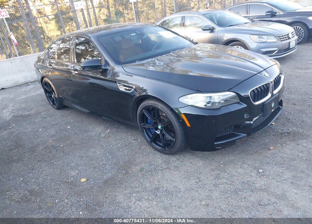 2014 BMW M5 VIN: WBSFV9C59ED594023