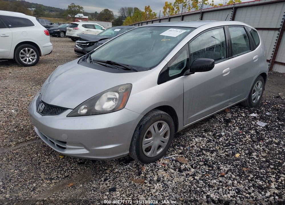 2011 HONDA FIT VIN: JHMGE8G38BS011672