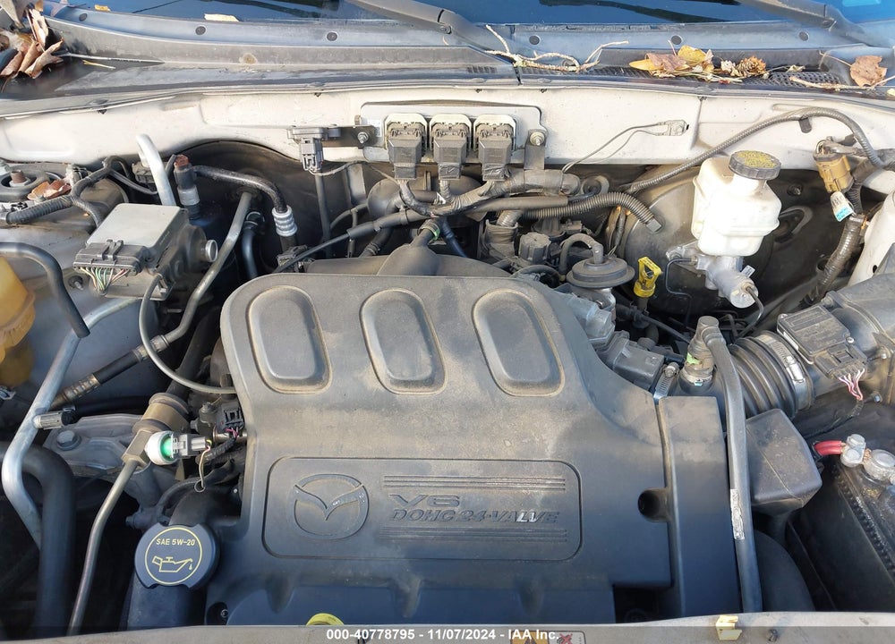 2005 MAZDA TRIBUTE S VIN: 4F2CZ04125KM35989