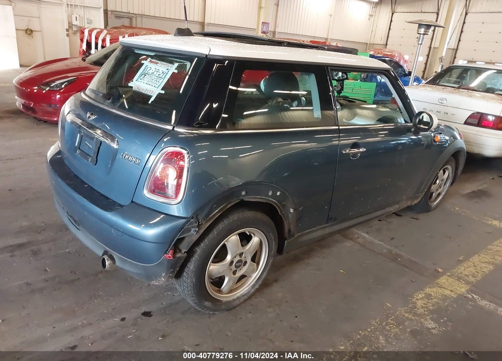 2010 MINI COOPER VIN: WMWMF3C5XATZ64126