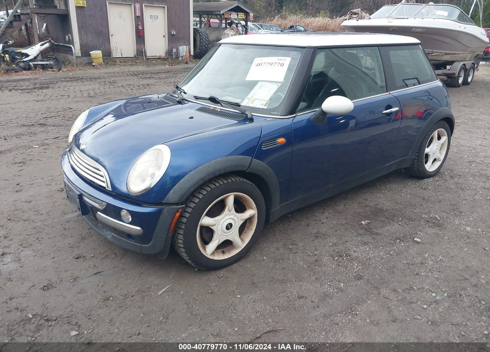 2003 MINI COOPER VIN: WMWRC33473TE19335