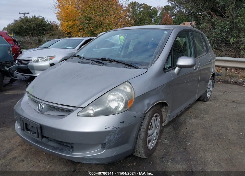 2007 HONDA FIT VIN: JHMGD38447S030580
