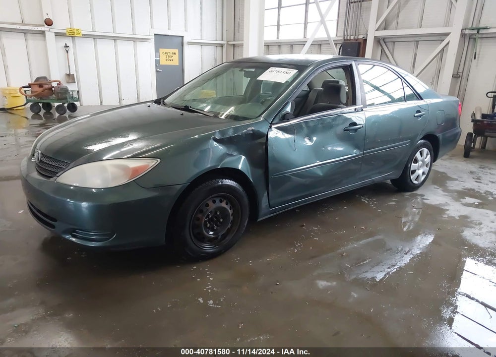 2004 TOYOTA CAMRY LE VIN: JTDBE32KX40267484