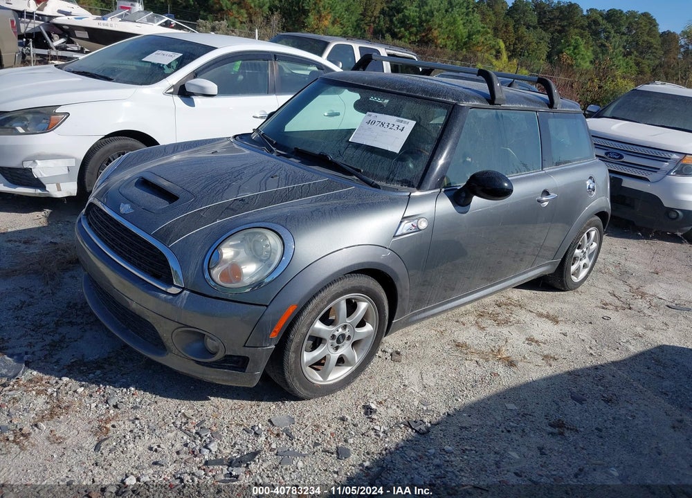 2009 MINI COOPER S VIN: WMWMF73549TW83734