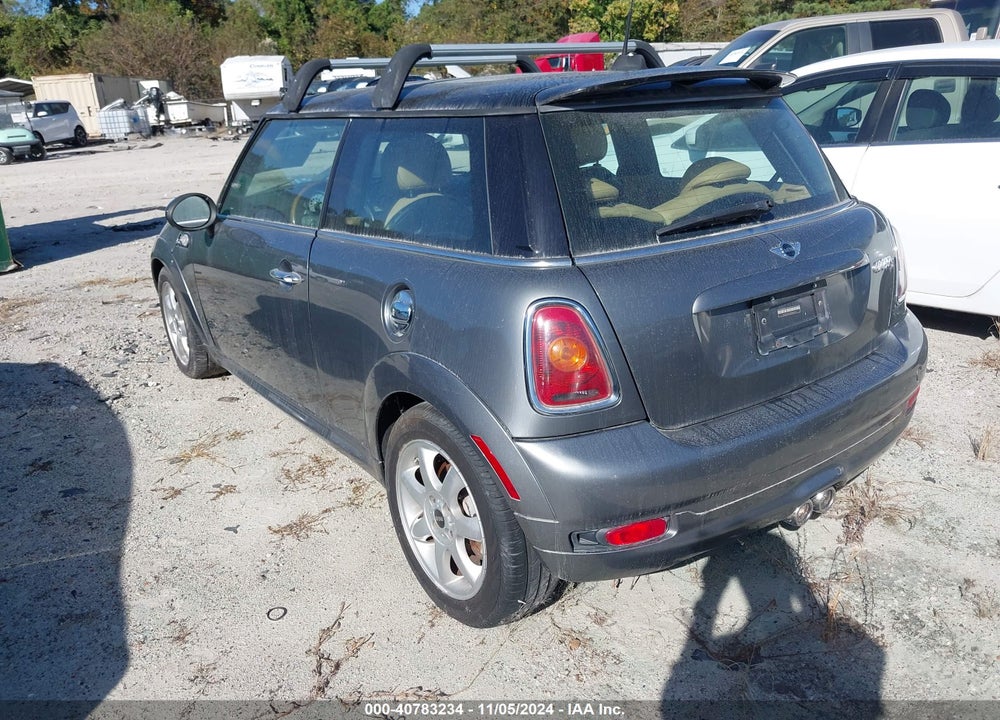 2009 MINI COOPER S VIN: WMWMF73549TW83734