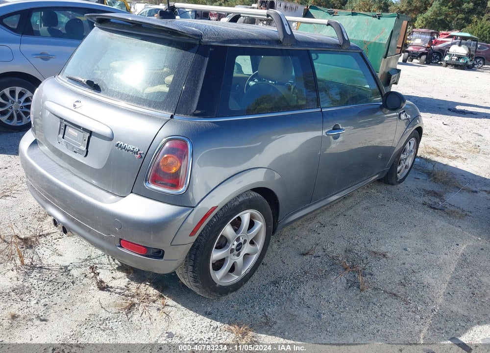 2009 MINI COOPER S VIN: WMWMF73549TW83734