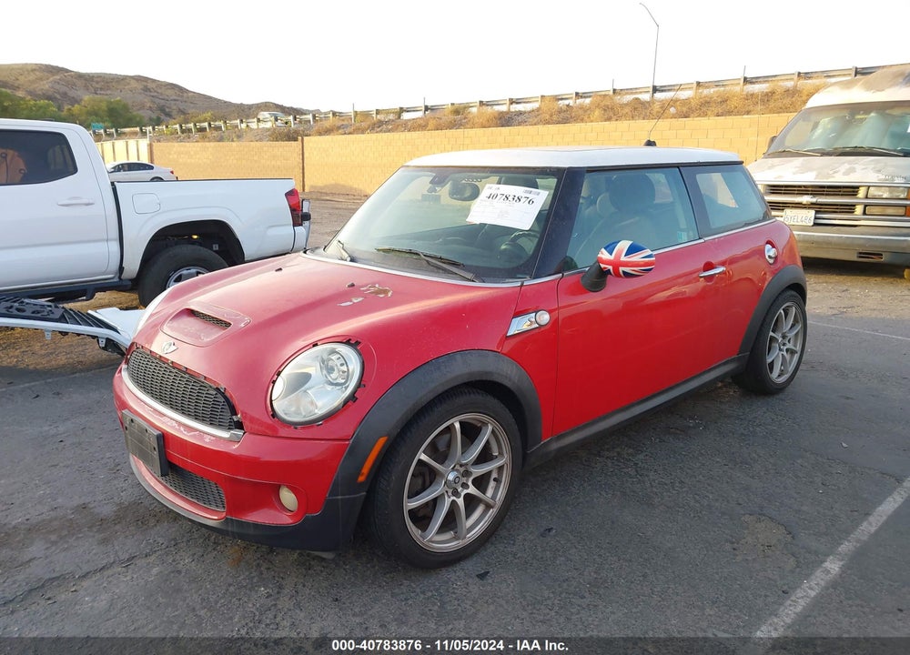 2007 MINI COOPER S VIN: WMWMF73577TL88883