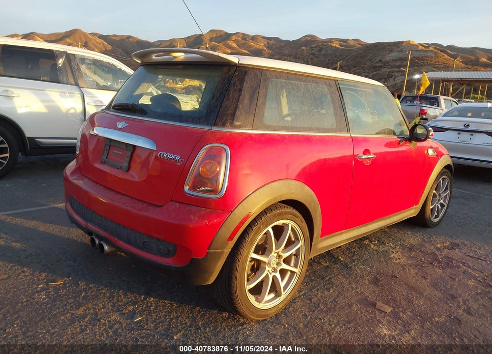 2007 MINI COOPER S VIN: WMWMF73577TL88883