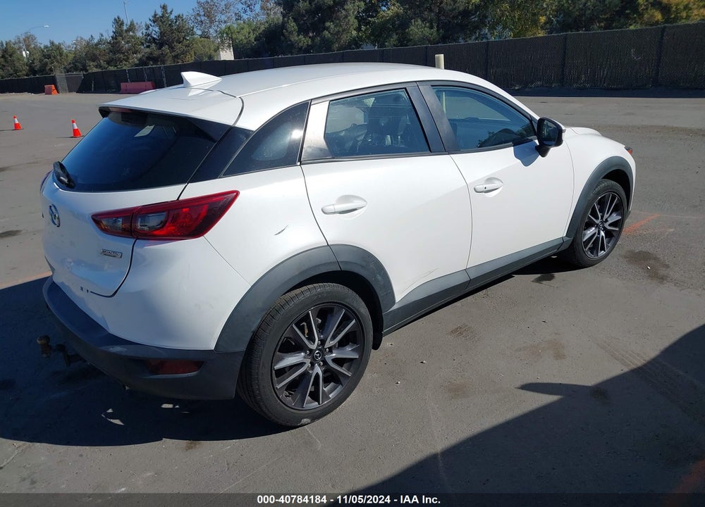 2018 MAZDA CX-3 TOURING VIN: JM1DKDC77J0325323