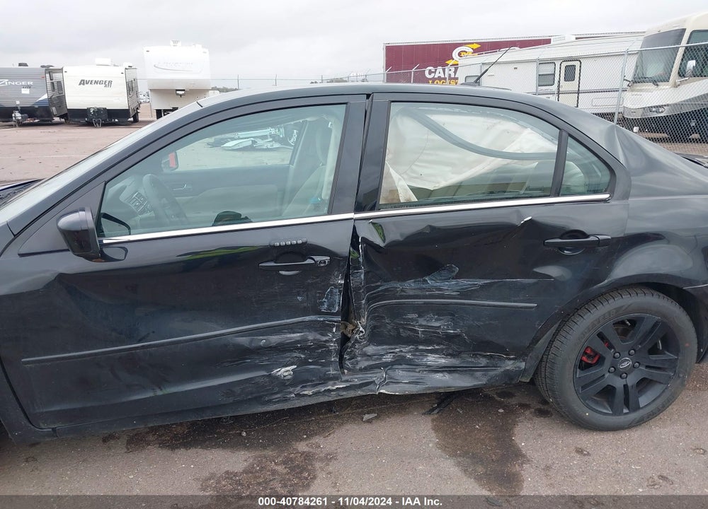 2009 FORD FUSION VIN: 3FAHP08119R183763
