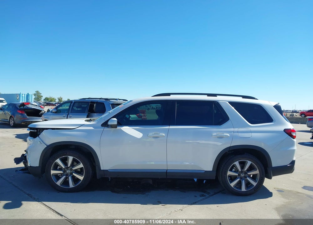 2023 HONDA PILOT 2WD TOURING VIN: 5FNYG2H71PB015422
