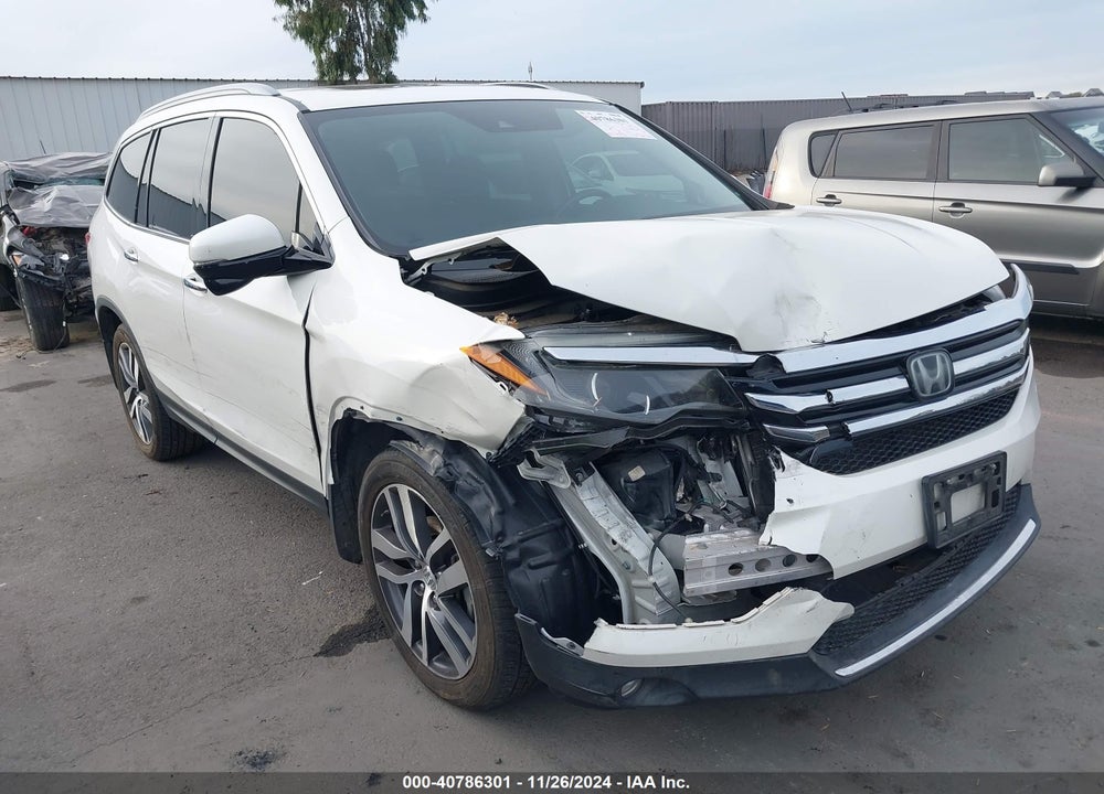 2018 HONDA PILOT TOURING VIN: 5FNYF5H97JB010576