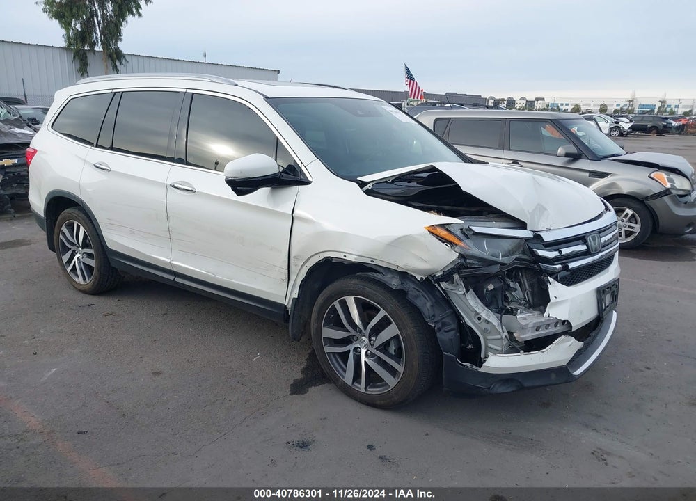 2018 HONDA PILOT TOURING VIN: 5FNYF5H97JB010576