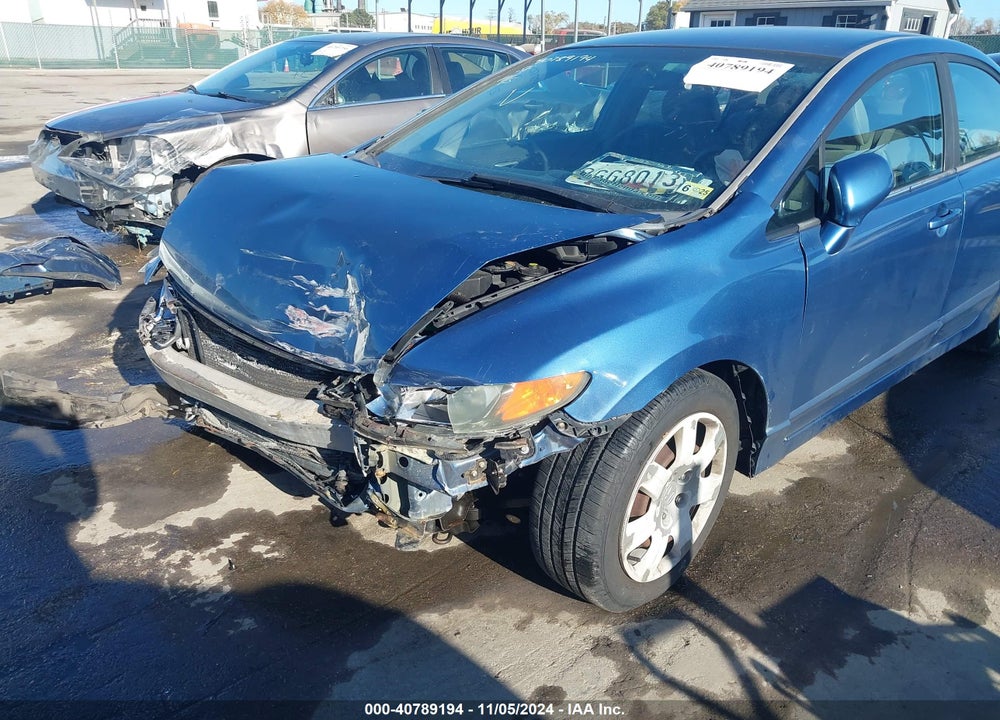 2006 HONDA CIVIC LX VIN: 1HGFA165X6L017980