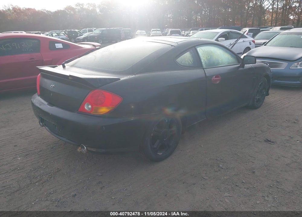 2003 HYUNDAI TIBURON VIN: KMHHM65D03U073402