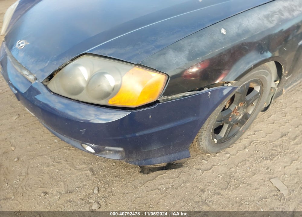 2003 HYUNDAI TIBURON VIN: KMHHM65D03U073402
