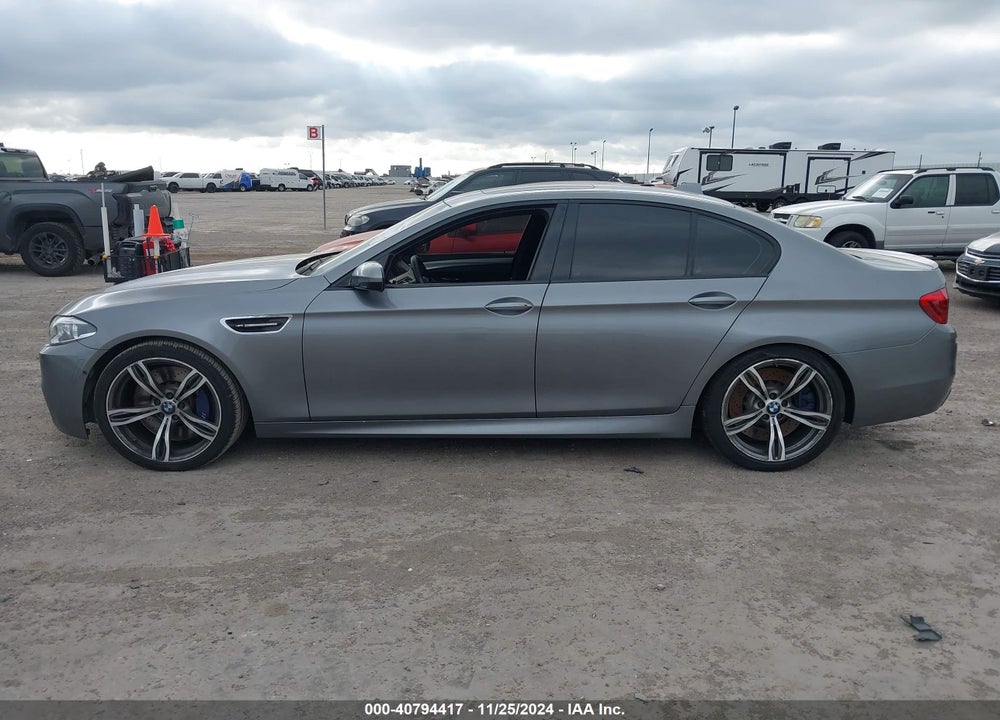 2014 BMW M5 VIN: WBSFV9C58ED593915