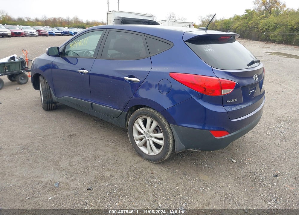 2013 HYUNDAI TUCSON LIMITED VIN: KM8JU3AC7DU662638
