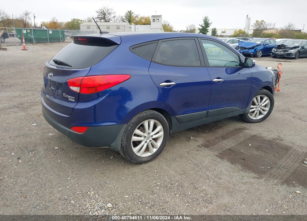 2013 HYUNDAI TUCSON LIMITED VIN: KM8JU3AC7DU662638