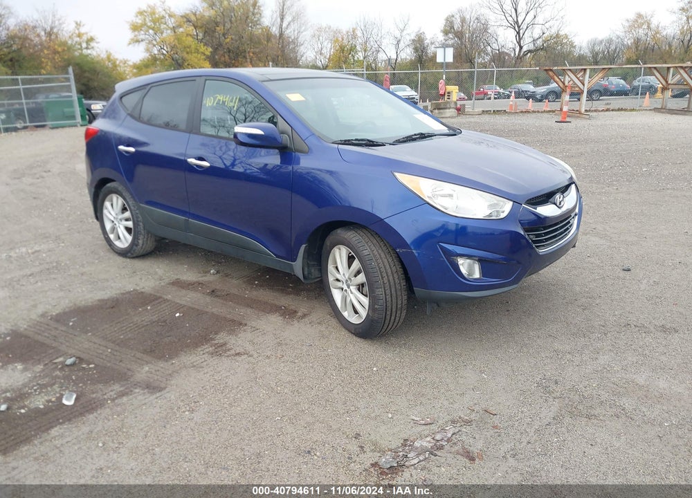 2013 HYUNDAI TUCSON LIMITED VIN: KM8JU3AC7DU662638