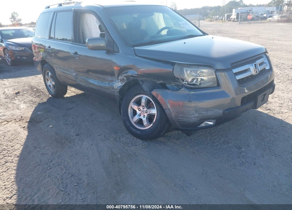 2007 HONDA PILOT EX-L VIN: 2HKYF18557H510042