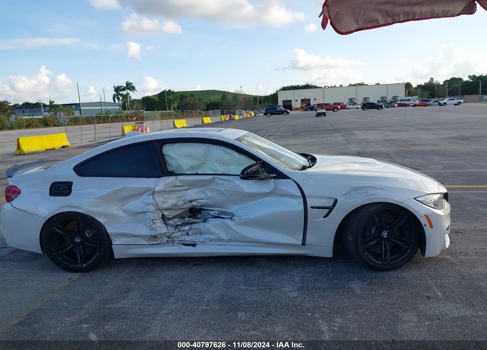 2015 BMW M4 VIN: WBS3R9C57FK332411