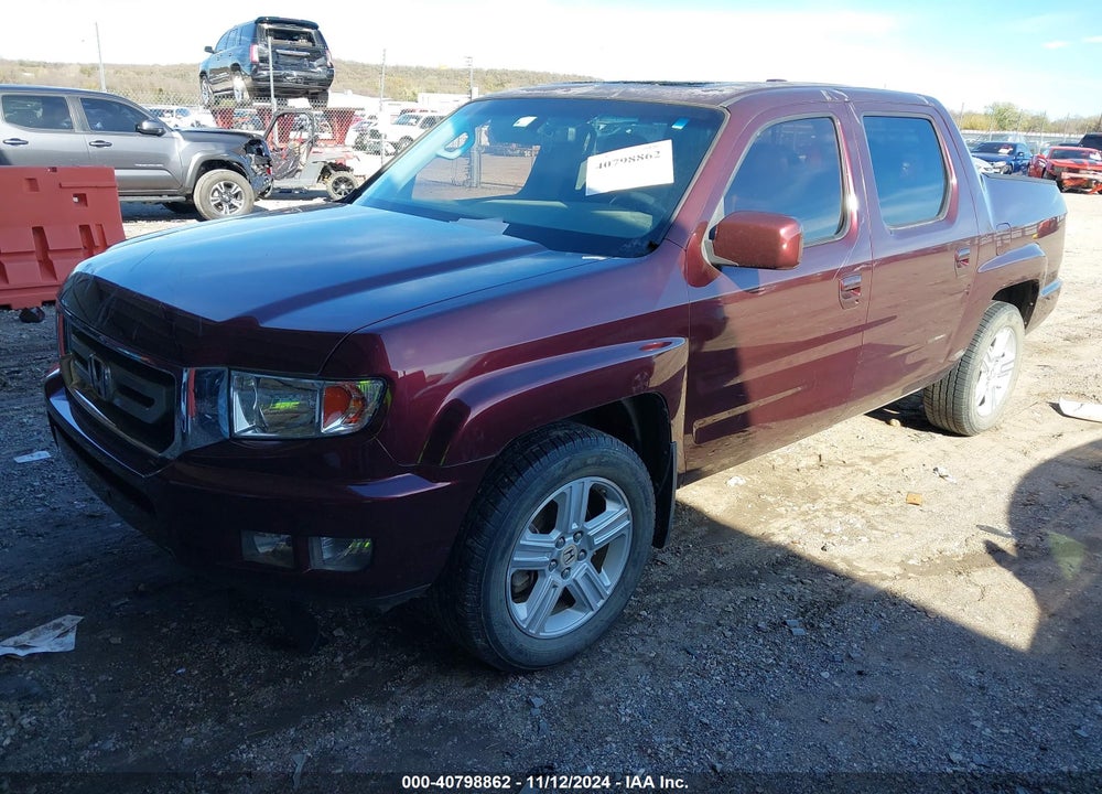 2010 HONDA RIDGELINE RTL VIN: 5FPYK1F51AB004199